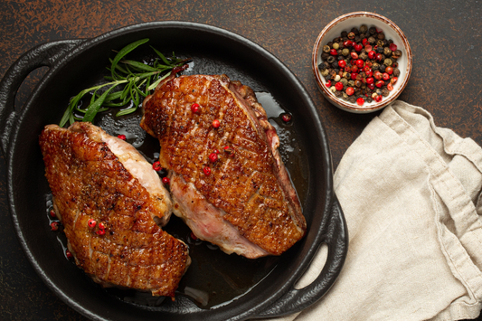 Two delicious pastured duck breasts are a sample cut in our local poultry share