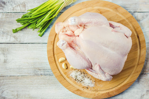 A raw whole chicken, non-GMO from Carolina Pastures in Hurdle Mills, NC