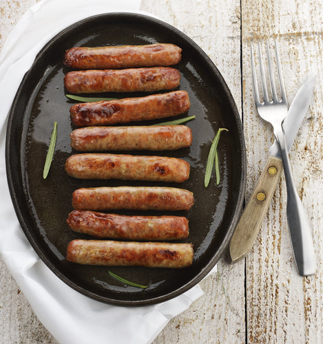 Local pastured pork breakfast sausage pinkies on a plate, pinky links