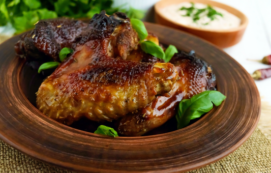 pasture raised non-GMO roasted duck wings in a bowl 